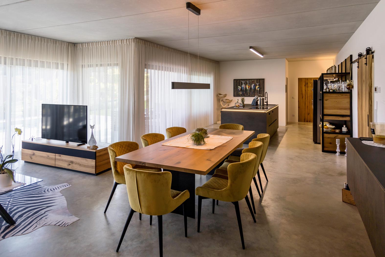 Käfer Bau Baufirma Baumeister Bauunternehmen Bauplanung Straden Südoststeiermark Steiermark beton betonarbeiten sichtbeton innenraum wohnzimmer