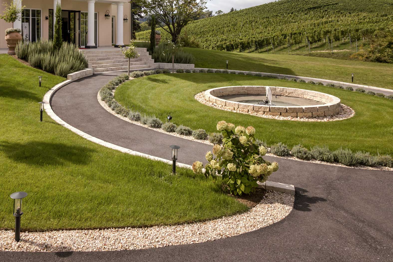 Käfer Bau Baufirma Baumeister Bauunternehmen Bauplanung Straden Südoststeiermark Steiermark gartenanlage zierkieswege gartenmauer steinmauer gartenhaus sichtschutz windschutz regenwasser-zisterne