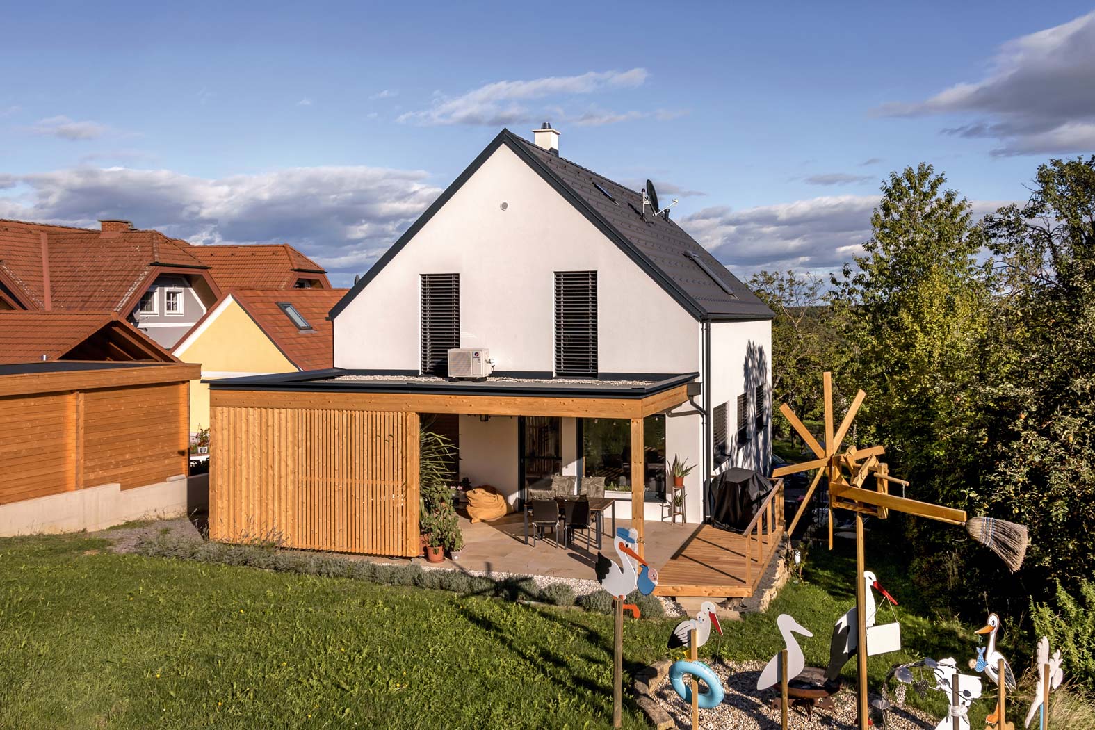 Käfer Bau Baufirma Baumeister Bauunternehmen Bauplanung Straden Südoststeiermark Steiermark aussenanlagen aussengestaltung terrasse balkon carport garage parkplatz